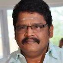 K. S. Ravikumar als man in the train