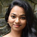 Rekha Kumanan als Archana
