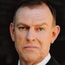 David Ross Paterson als Bird TV Show Presenter