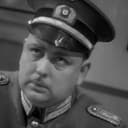 Raymond Lovell als Inspector Forsythe