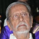 Charu Haasan als Krishnamurthy Shastri