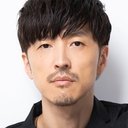 櫻井孝宏 als Izumo Kusanagi (voice)