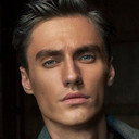 Aleksey Shamayev als TV announcer