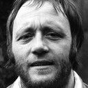 John Bindon als Strongman at Party