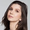 Priscila Assum als Corretora de Imóveis (segment "A Musa")