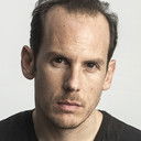 Peter Rundle als Troika Functionary