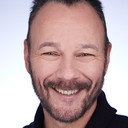 James Tackett als Burke