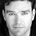 Kevin Neil McCready als Agent Paul Rhodes