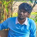 Ezhil als Karthik Swaminathan