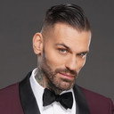 Matt Polinsky als Corey Graves