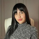 Karen Bolivar als The Medium