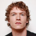 Connor Storrie als Baxter