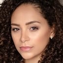 Tanairi Sade Vazquez als Charita