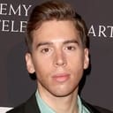 Jordan Gavaris als US EX Guy