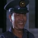 Tadashi Okabe als Police Officer