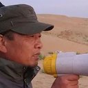 Qiang Xiaolu, Assistant Director