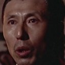 Man Man als Japanese officer at meeting