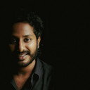 Dravid Selvan als Dravid