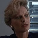 Marylou Kenworthy als Banker/Loan Officer