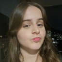 Milena Vilarinho als Clinic Receptionist