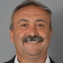 Turgut Çalhan als Postcard Seller