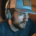 Travis Carlson, Director