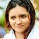 Monika Thomas Puthuran als Eliza
