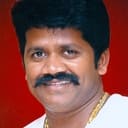 J. K. Rithesh als Guru