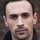 Alex Mugnaioni als Barista