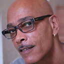 Garry Q. Lewis als Puss
