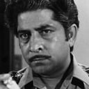 Satyendra Kapoor als Dhanraj Saxena