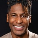 Jon Batiste als Grady