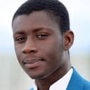 Amadou Mbow als Assane