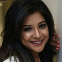 Sakshi Agarwal als Niranjana's Colleague