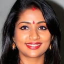 Navya Nair als Sherin Mathew