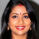 Navya Nair als Balamani