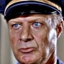 Russ Bender als Police Sergeant Harris