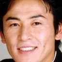 舘昌美 als Man at Laptop