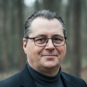 Mark Baars als Agent bureau Warmoesstraat