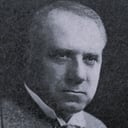 Ernest Maupain als Prof. Belliarti
