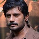 Muthukumar als Rajan