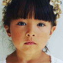 Shirelle Mai-Yvart als Little girl on a bicycle