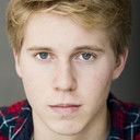 Emmett Carnahan als West High Student Announcer