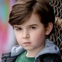 Simon Webster als Reed