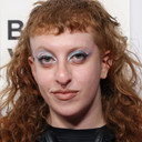 Spike Einbinder als April