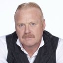 Thomas Craig als Debt Enforcer