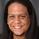 Chaka DeSilva als Roland