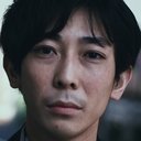 石田武久 als Man on a Bicycle