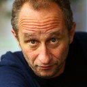 Benoît Poelvoorde als God