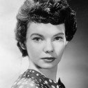Joan Elan als Charity Fell